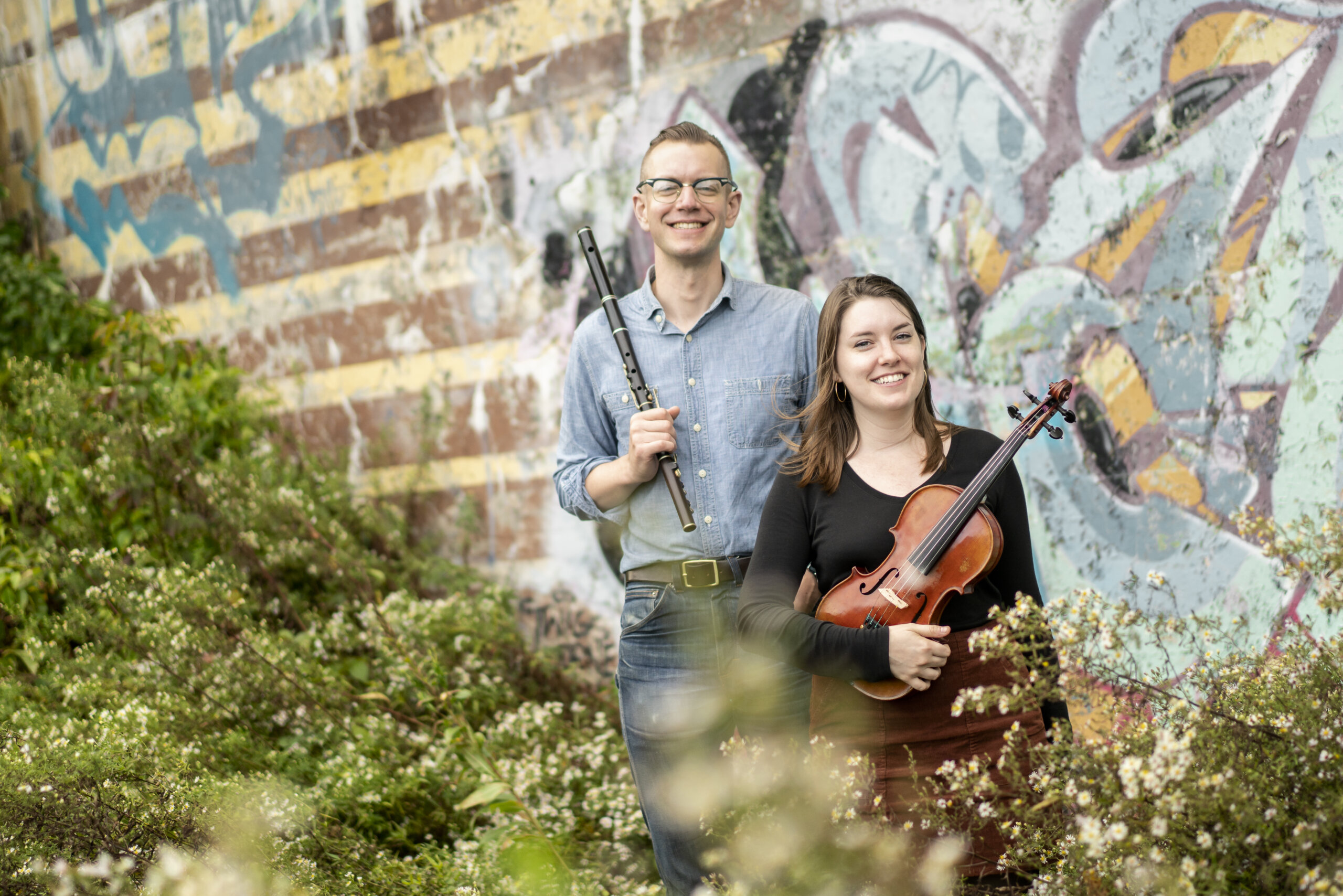 Will Woodson (flute, uilleann pipes) and Cait Finley (fiddle)